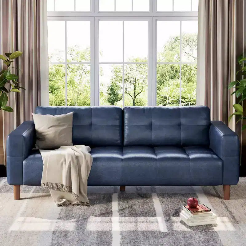 Divano a 3 posti in similpelle largo 210 cm con sedute profonde e cuscini dello schienale rimovibili